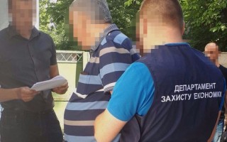 В Киеве адвокат погорел на крупной взятке. ФОТО