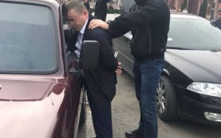 СБУ поймала на взятке майора полиции (фото)