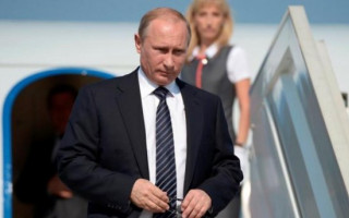 Путин прилетел во временно оккупированный Крым