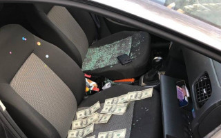 ДБР затримало поліцейського, який отримав $ 2000 хабара