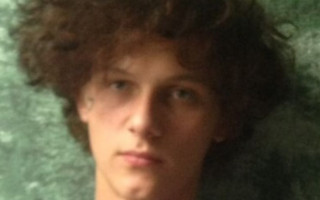 Под Киевом разыскивают парня с татуировкой на лице