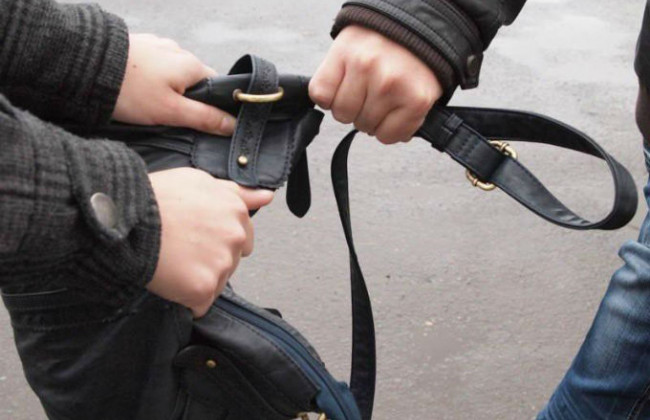 Киянам показали небезпечного грабіжника, фото і відео