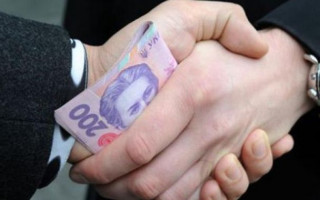 Погоріли на великому хабарі: у Києві судитимуть екс-поліцейських