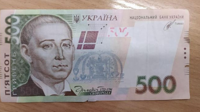 Под Киевом распространяли фальшивые деньги: что известно
