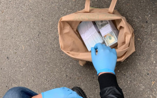 У Полтаві затримали депутата на отриманні $160000: фото