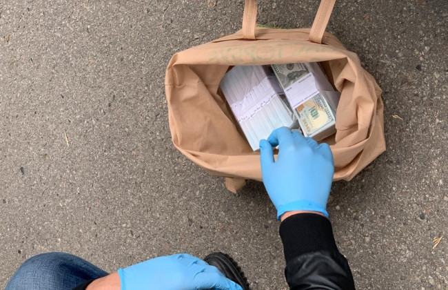 У Полтаві затримали депутата на отриманні $160000: фото