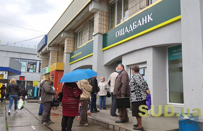 Транспортные спецпропуска, очереди у Ощадбанка и открытые рынки — как живет столица на карантине 12 мая, фото