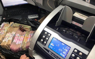 Кіберполіція викрила мережу обміну валют у шахрайстві