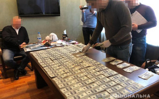 Посадовець Мін'юсту постане перед судом за вимагання $55 000 хабаря