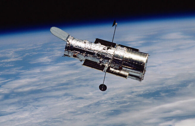 Астрономы сделали снимок галактики, похожей на водопад: впечатляющее фото