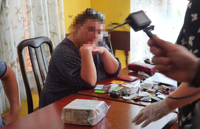 Судитимуть жінку, яка вимагала ₴4 мільйони за вплив на службовців АМКУ  для зменшення штрафу