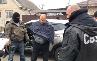 Вимагав 26 800 доларів з погрозою вбивства: на Харківщині затримано чоловіка