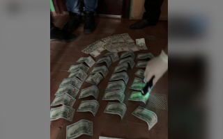 Вимагання $3000 за укриття доказів: ДБР затримало посадовця одеської поліції
