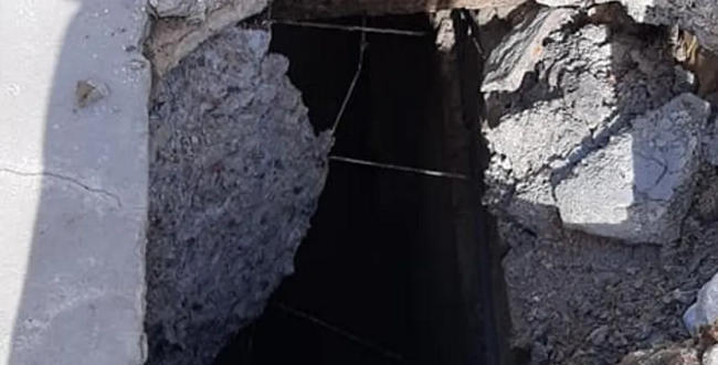 В Киеве возле аптеки женщина провалилась в 2-метровую яму: фото, видео