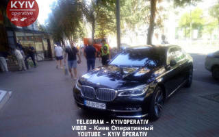 В Киеве водитель авто и охранники магазина подрались с парковщиком