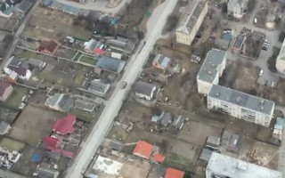 CNN заполучил видео, снятое в Буче в марте: на нем оккупанты запечатлены рядом с телами украинцев