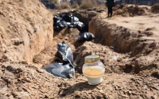 Под Бучей обнаружили еще одно захоронение с расстрелянными людьми