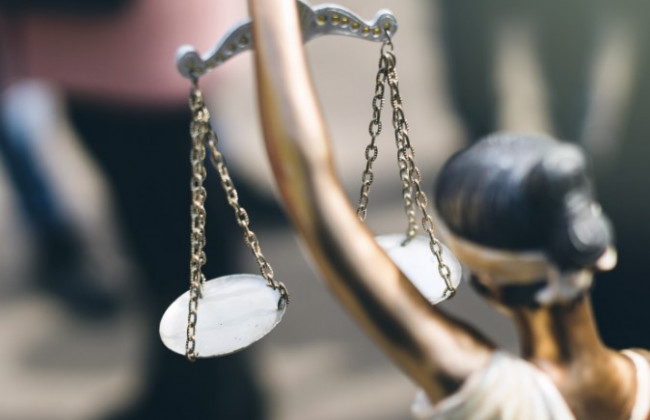 Суд визнав протиправною бездіяльність міської ради, яка не прийняла рішення за заявою мешканки