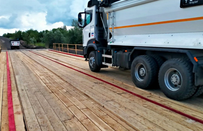 На Чернігівщині відкрили рух по тимчасовому проїзду біля зруйнованого мосту