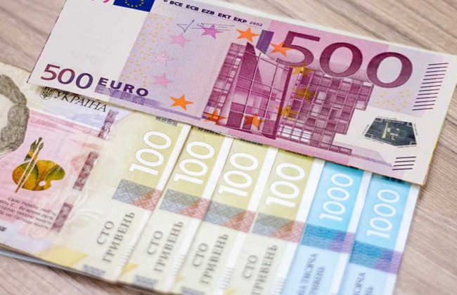 Германия прекратит льготный обмен гривны на евро для беженцев до конца октября