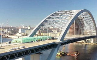 Розкрадання 104 млн грн на будівництві Подільського мосту: повідомлено про підозру ще трьом учасникам схеми