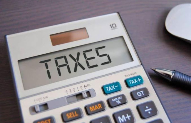 Податкове резидентство: як українцям платити податки за кордоном