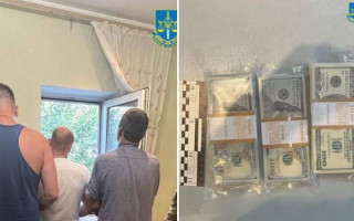 Відібрали в підприємця $40 000 та ₴80 000: затримали зловмисників