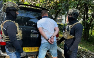 У Києві посадовець КМДА брав данину з автоперевізників на сотні тисяч доларів