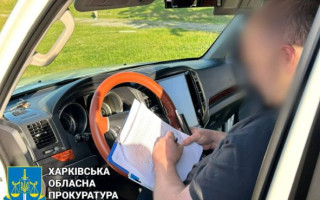 В Харькове на взятке в $1500 погорел смотритель кладбища, фото