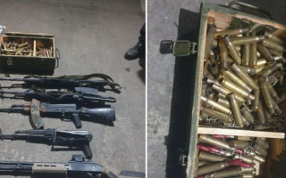 В Киевской области военнослужащий военкомата хранил арсенал оружия и боеприпасов, фото