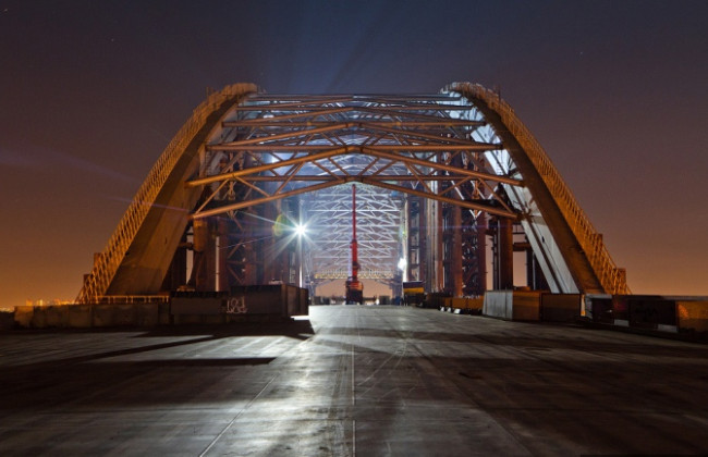 Завысили на 24 млн грн расходы при строительстве Подольского моста: сообщено о подозрении руководителю столичного КП