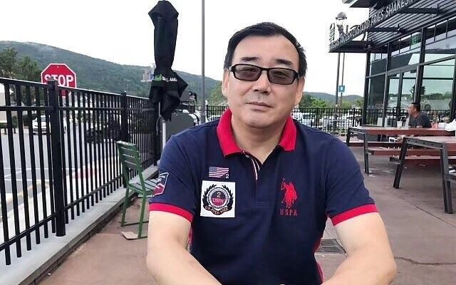 Китай вынес условный смертный приговор австралийскому писателю после пяти лет заключения