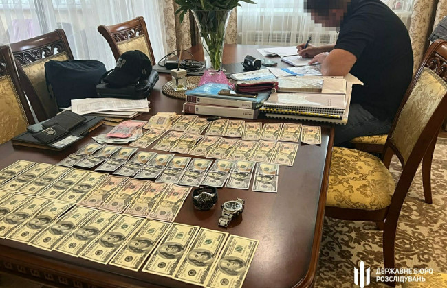 Земельные участки, элитные дома и автомобиль Porsche: правоохранителю из Днепра объявили подозрение в незаконном обогащении