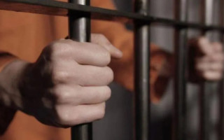 Стріляли у під’їзді: у Києві засудили одного з нападників на священника