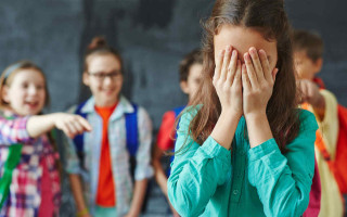 Более половины украинских школьников сталкивались с буллингом: исследование
