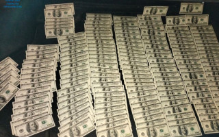 Во Львове будут судить банду, продававшую фальшивые доллары