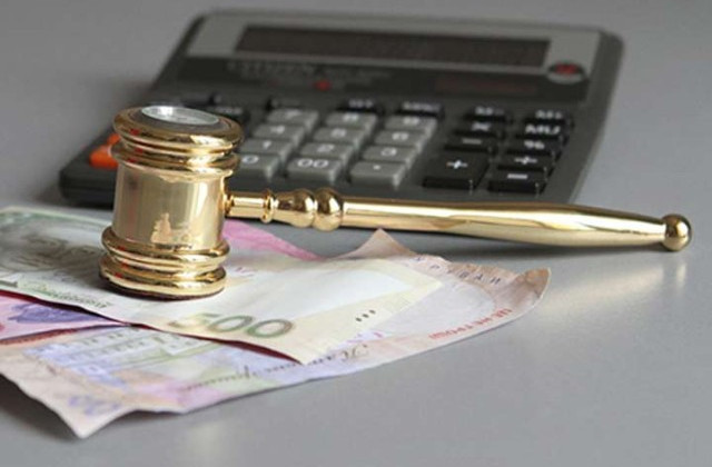 Может ли налоговый долг может ограничить выезд за границу – разъяснение ГНС