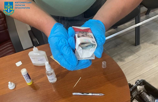 Жительница Житомирской области предлагала полицейскому 20 тысяч гривен при содействии в незаконной перевозке древесины