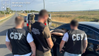 На Миколаївщині поліцейського спіймали на хабарі $2000 за «звільнення» від мобілізації