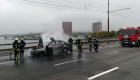 У Києві на Північному мосту під час руху загорівся автомобіль, фото і відео