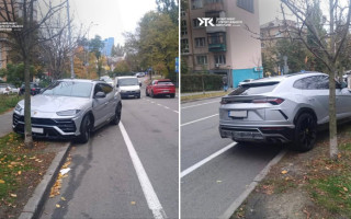У Києві покарали водія Porsche, який запаркував авто на зеленій зоні та велосмузі, фото