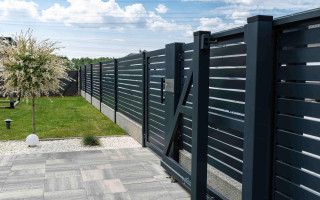 Огорожі й асфальтові майданчики не підлягають податку на нерухомість — Верховний Суд