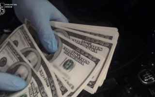 $30 за фальшиві $100: на Одещині викрили схему збуту підробленої валюти