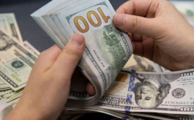 За 1000 підроблених доларів — 500 справжніх: у Києві судитимуть збувачів фальшивих грошей