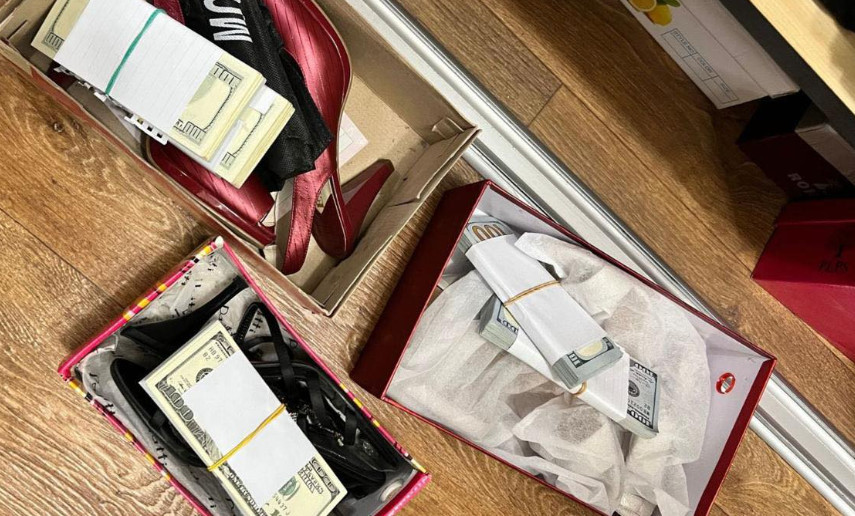В Днепре разворовали более 14 млн грн на утеплении школ — деньги прятали в коробках для обуви, фото