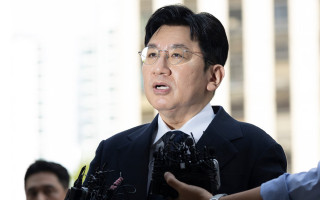 Поліція Південної Кореї домагається арешту продюсера K-pop гурту «BTS» через підозру у шахрайстві на $100 млн