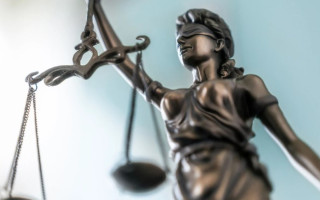 У Лондоні судять чоловіка, який застрелив двоюрідного брата та намагався вбити іншого родича після сварки на поминках