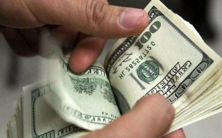 Man appealed punishment for attempting to give $100 to a police officer – appellate court doubled the fine