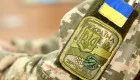 Военный ради увольнения со службы купил поддельную инвалидность для жены за 2 тысячи долларов: дело передано в суд