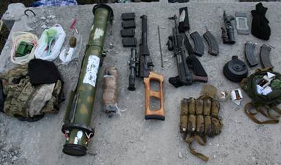 СБУ обнаружила тайники с оружием и боеприпасами в Харьковской и Хмельницкой областях